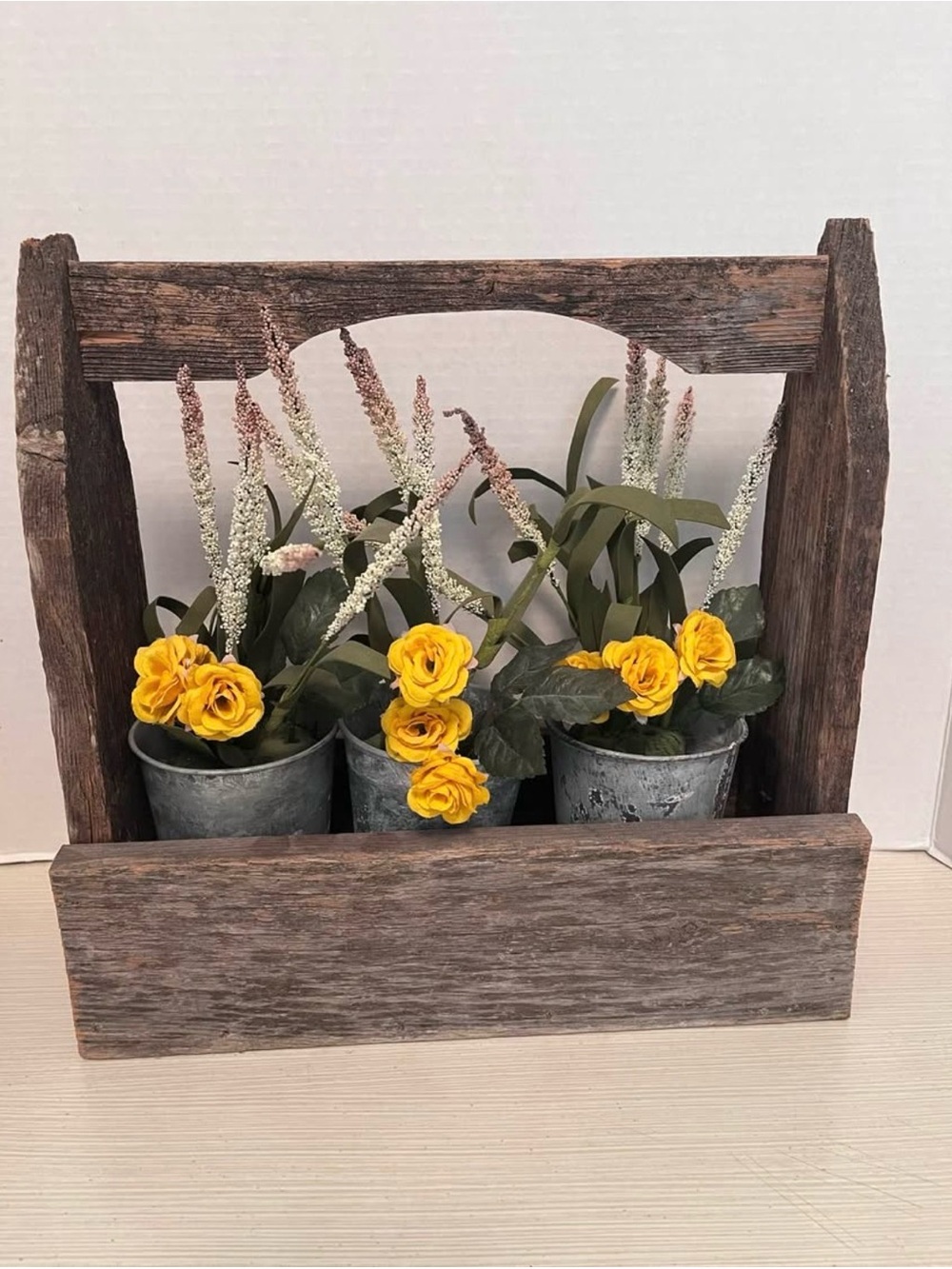 Rustic Wooden Planter Box with Metal Containers of Flowers